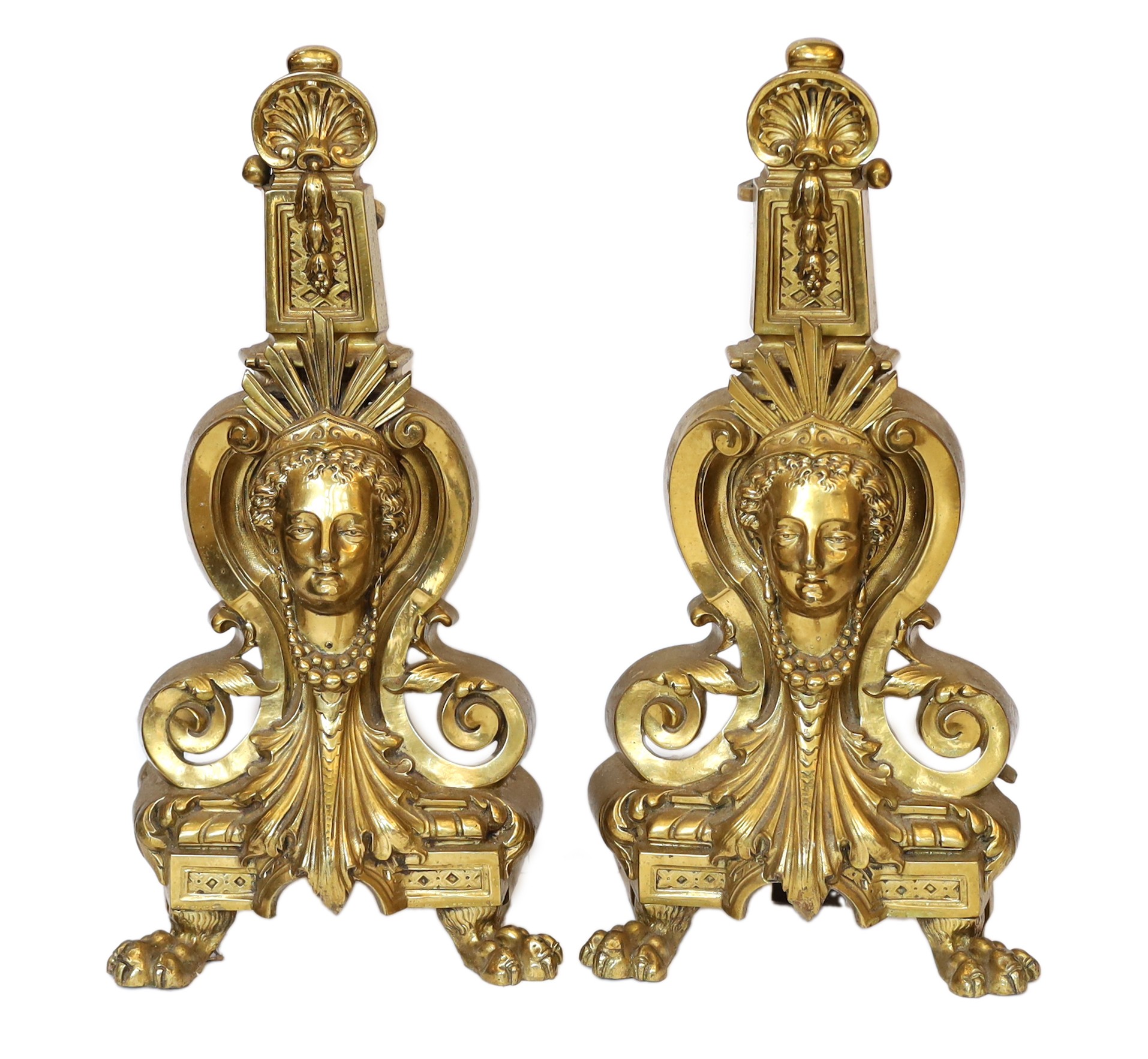 A pair of Louis XVI style gilt brass chenets, height 43cm